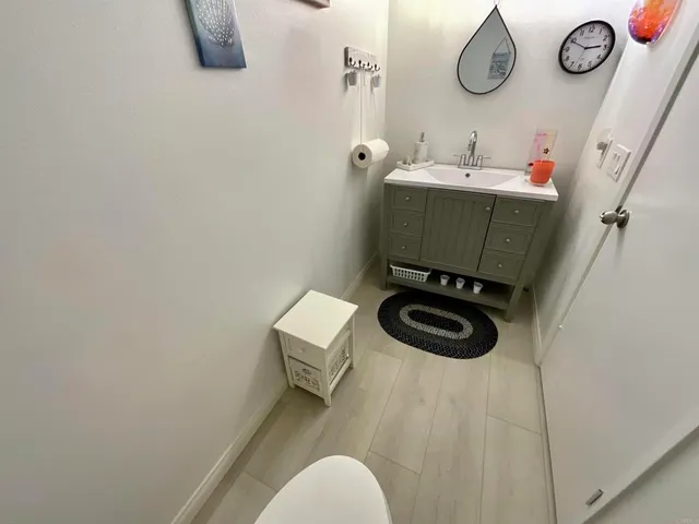 a bathroom with a toilet and a sink