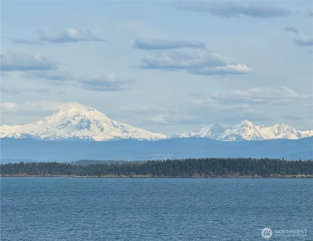 a view of mountain with lake view