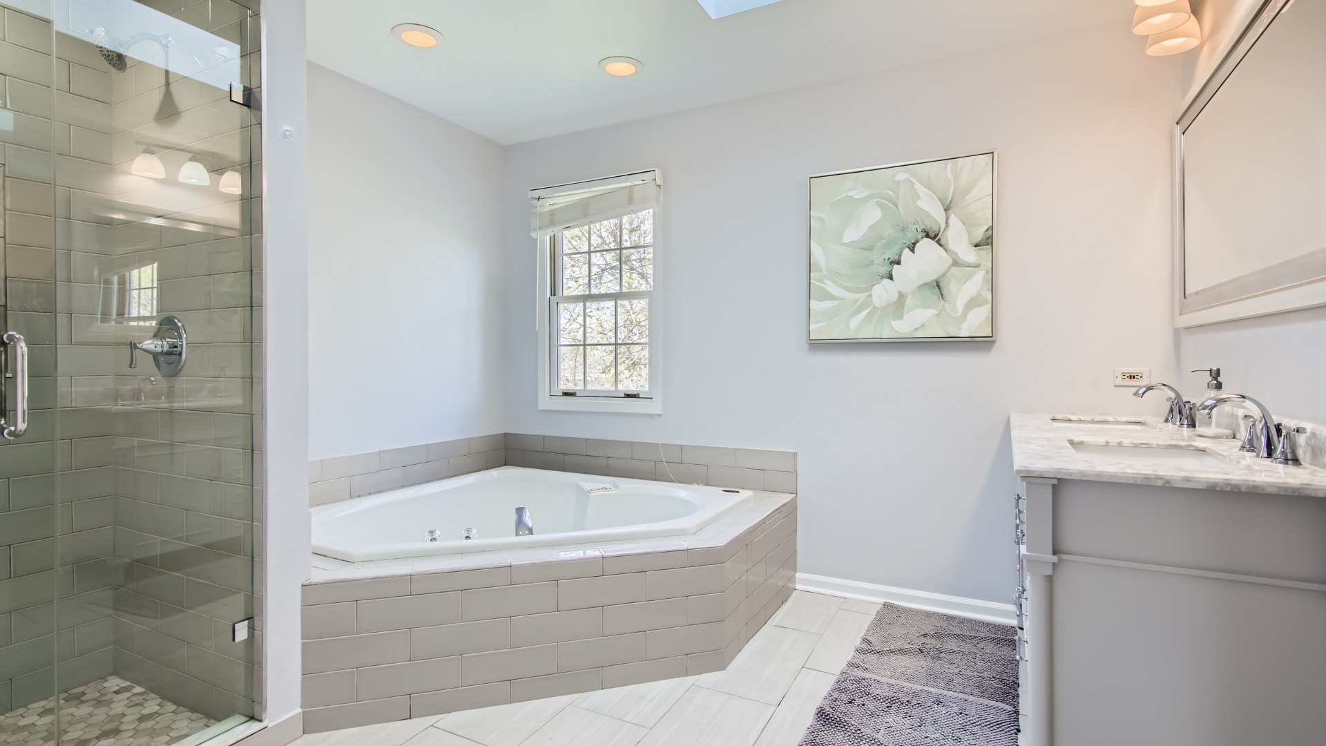 269 Concord Square Gurnee, IL 60031 - Photo 21 of 28 a bathroom with a tub and sink
