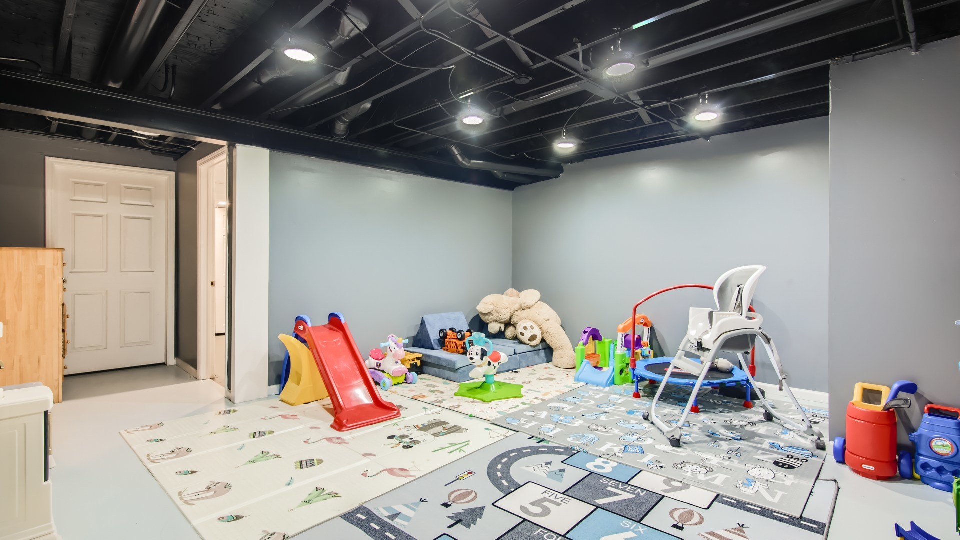 269 Concord Square Gurnee, IL 60031 - Photo 27 of 28 a wooden floor with a table and chairs