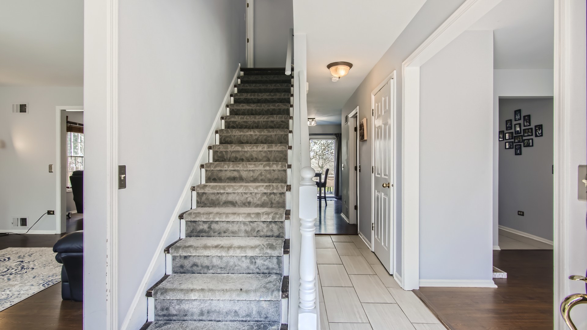 269 Concord Square Gurnee, IL 60031 - Photo 9 of 28 a view of a hallway with wooden floor and entryway