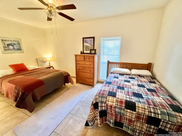 a bedroom with a bed and walk in closet