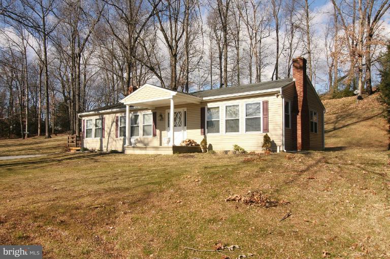 245 Stem Road Union Bridge, MD 21791 - Photo 1 of 26 a front view of a house with yard and green space