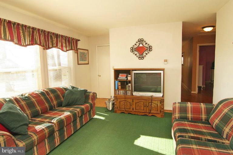 245 Stem Road Union Bridge, MD 21791 - Photo 14 of 26 a living room with furniture and a flat screen tv