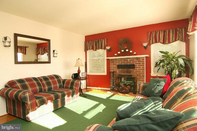 245 Stem Road Union Bridge, MD 21791 - Photo 15 of 26 a living room with furniture and a fireplace