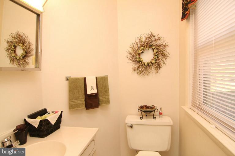 245 Stem Road Union Bridge, MD 21791 - Photo 19 of 26 a bathroom with a sink mirror and toilet