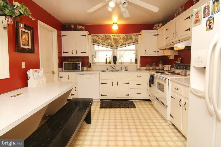 245 Stem Road Union Bridge, MD 21791 - Photo 3 of 26 a large kitchen with stainless steel appliances a stove a sink dishwasher and a refrigerator