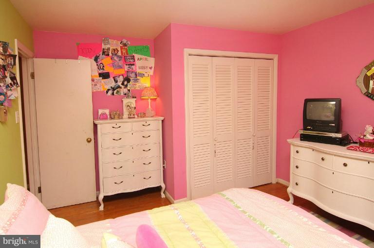 245 Stem Road Union Bridge, MD 21791 - Photo 21 of 26 a bedroom with a bed and a dresser in it