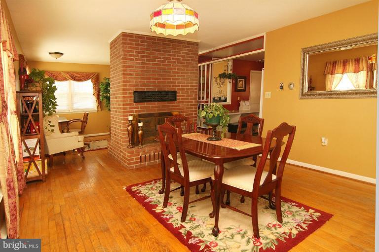 245 Stem Road Union Bridge, MD 21791 - Photo 7 of 26 a dining room with furniture and wooden floor