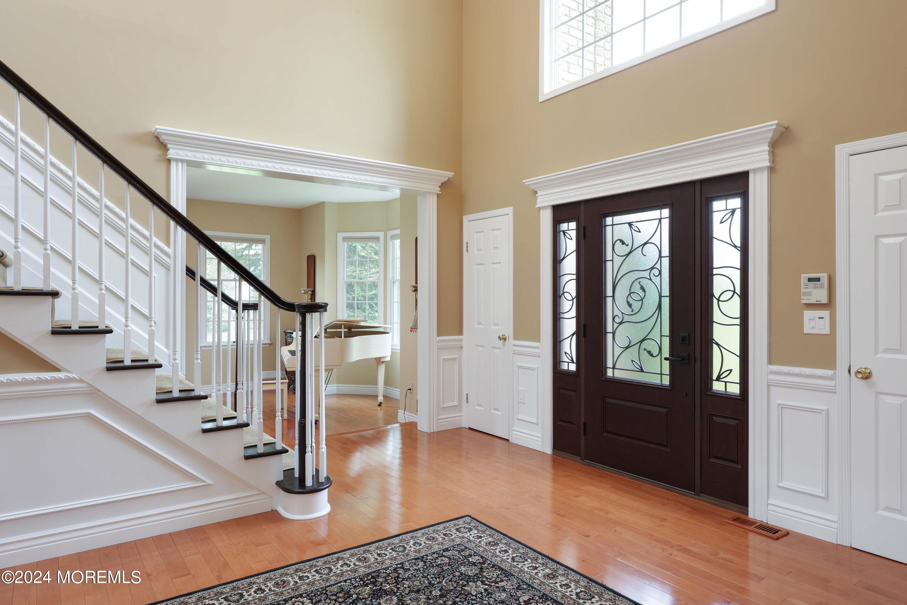12 Shadowbrook Drive Colts Neck, NJ 07722 - Photo 5 of 33 a view of entryway and hall with wooden floor