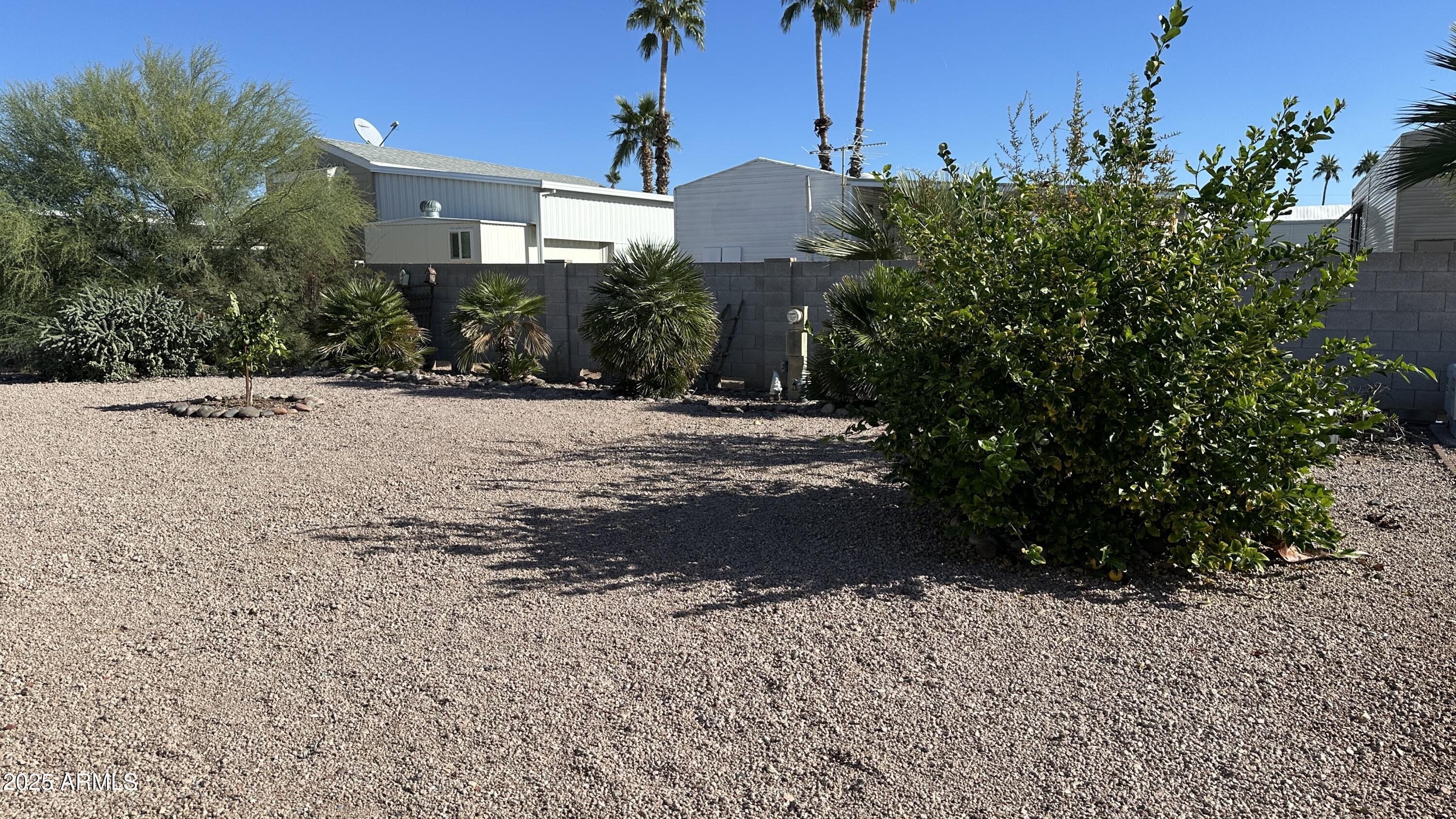 834 South Meridian Road, Unit 105 Apache Junction, AZ 85120 - Photo 31 of 48 a view of a house with a street