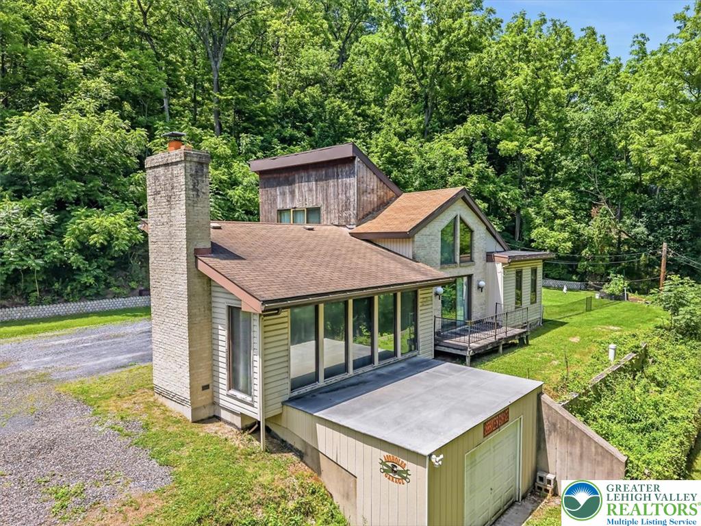 5340 2nd Street Whitehall, PA 18052 - Photo 1 of 30 An inviting exterior with ample parking and lush greenery surrounds this charming residence.