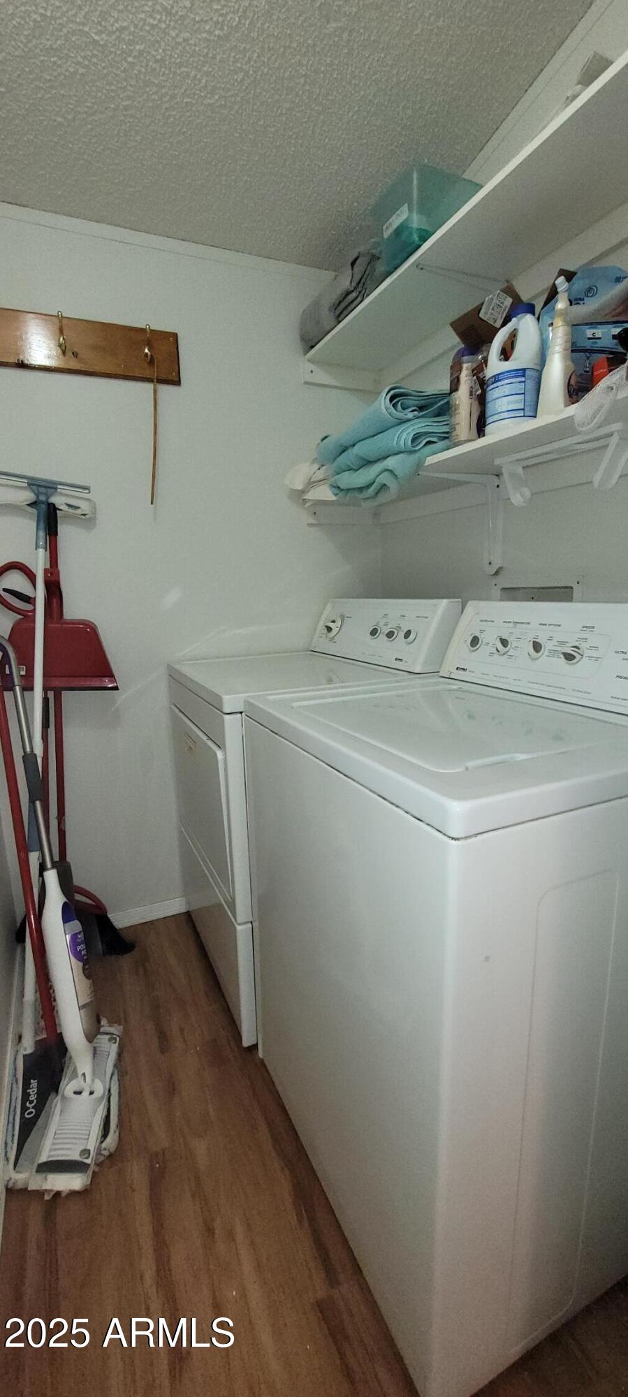 30850 South Vagabond Trail, Unit 87 Congress, AZ 85332 - Photo 12 of 19 a utility room with dryer and washer