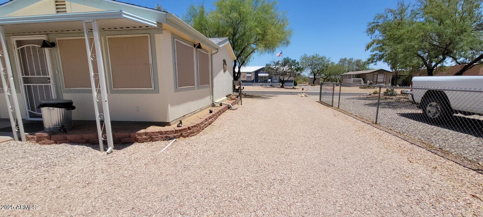 30850 South Vagabond Trail, Unit 87 Congress, AZ 85332 - Photo 13 of 19 a view of a street with cars