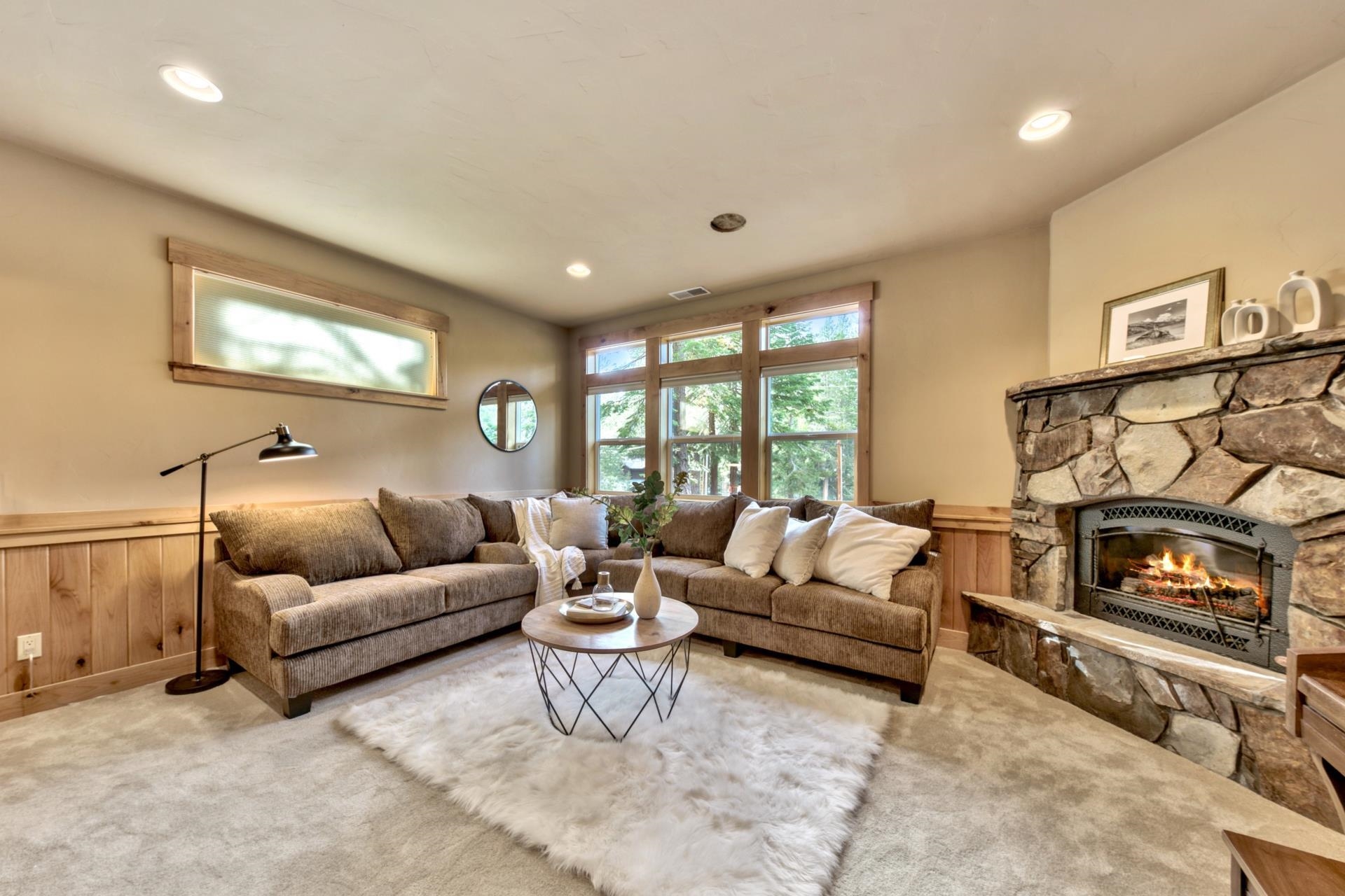 14121 Swiss Lane Truckee, CA 96161 - Photo 20 of 21 a living room with furniture and a fireplace