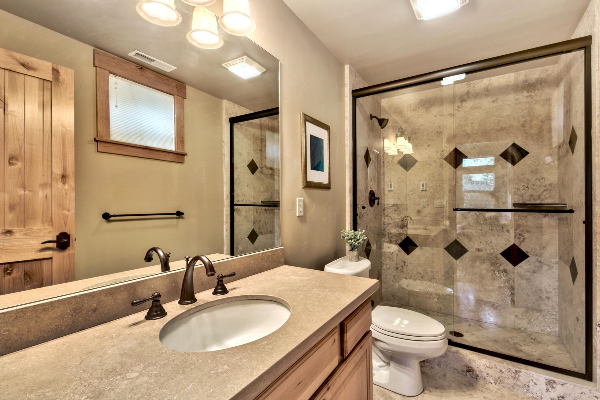 14121 Swiss Lane Truckee, CA 96161 - Photo 21 of 21 a bathroom with a sink toilet and shower
