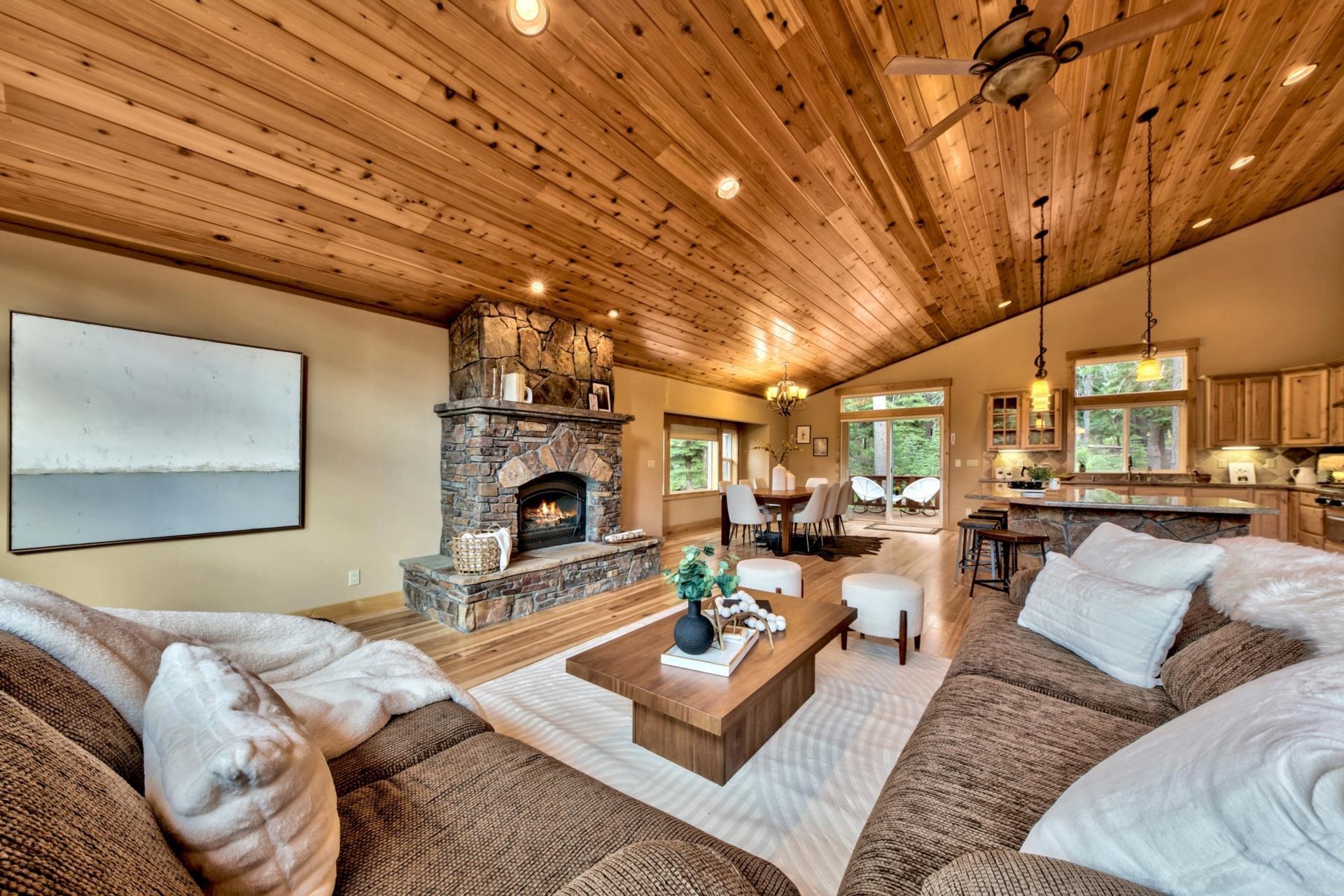 14121 Swiss Lane Truckee, CA 96161 - Photo 5 of 21 a living room with furniture and a fireplace