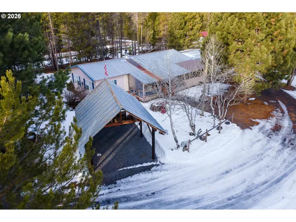 a view of a backyard with a cabin