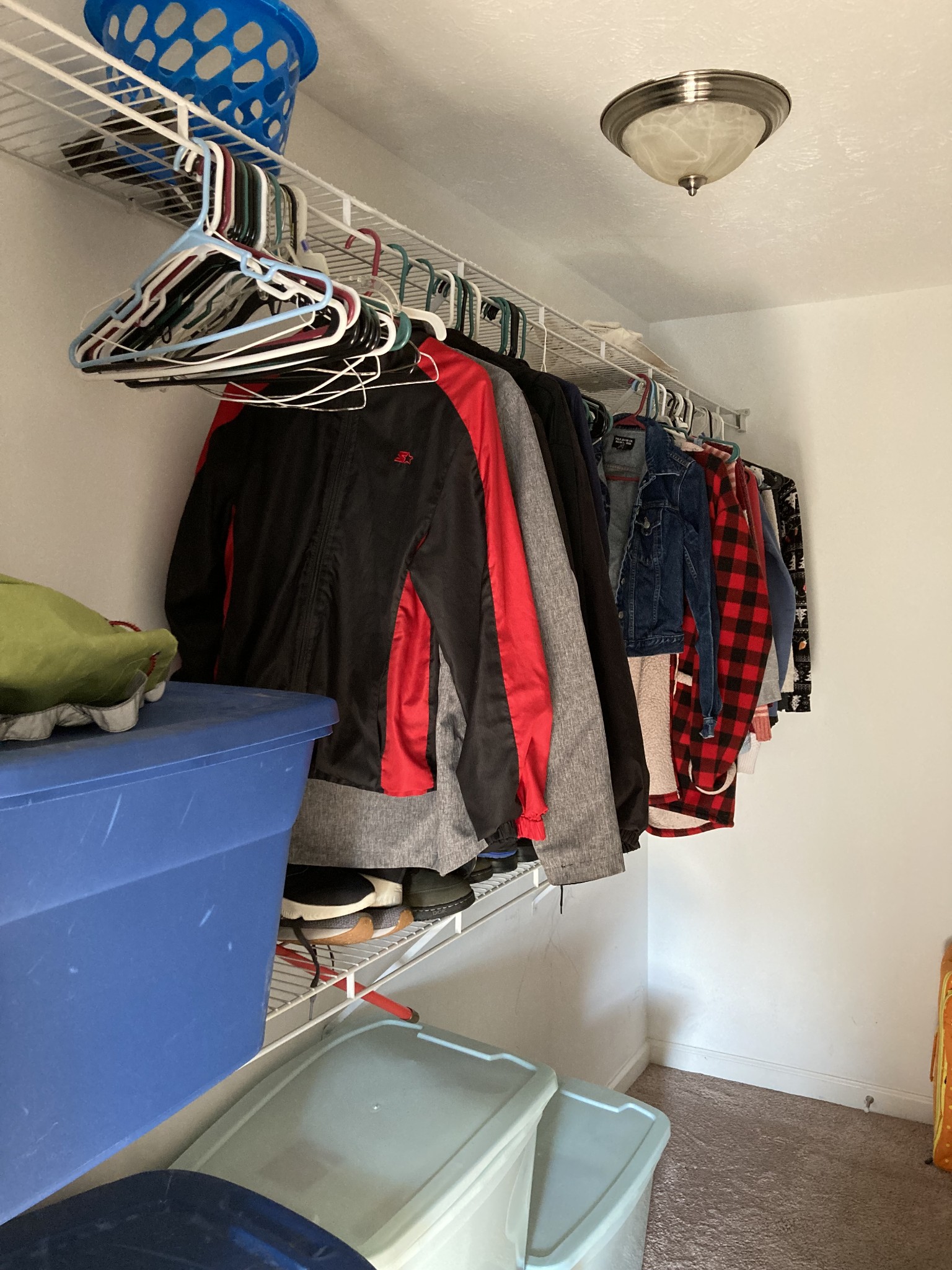 420 Elysian Fields Road, Unit E5 Nashville, TN 37211 - Photo 12 of 14 a view of walk in closet with clothes and shoes