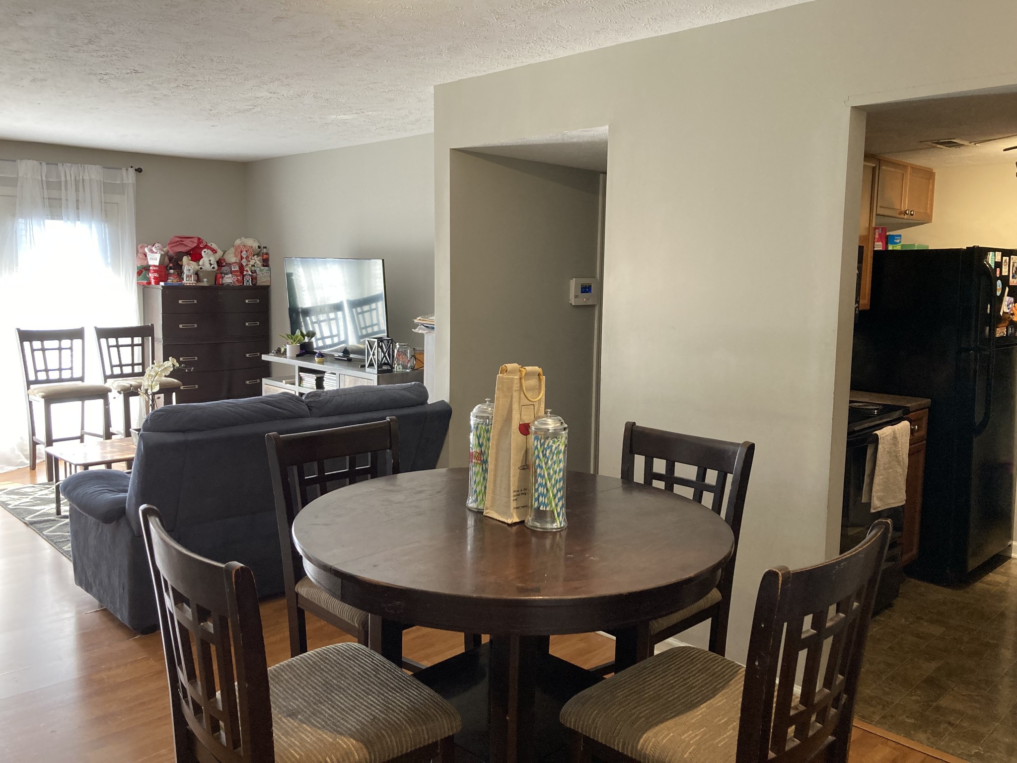 420 Elysian Fields Road, Unit E5 Nashville, TN 37211 - Photo 4 of 14 a view of a dining room with furniture