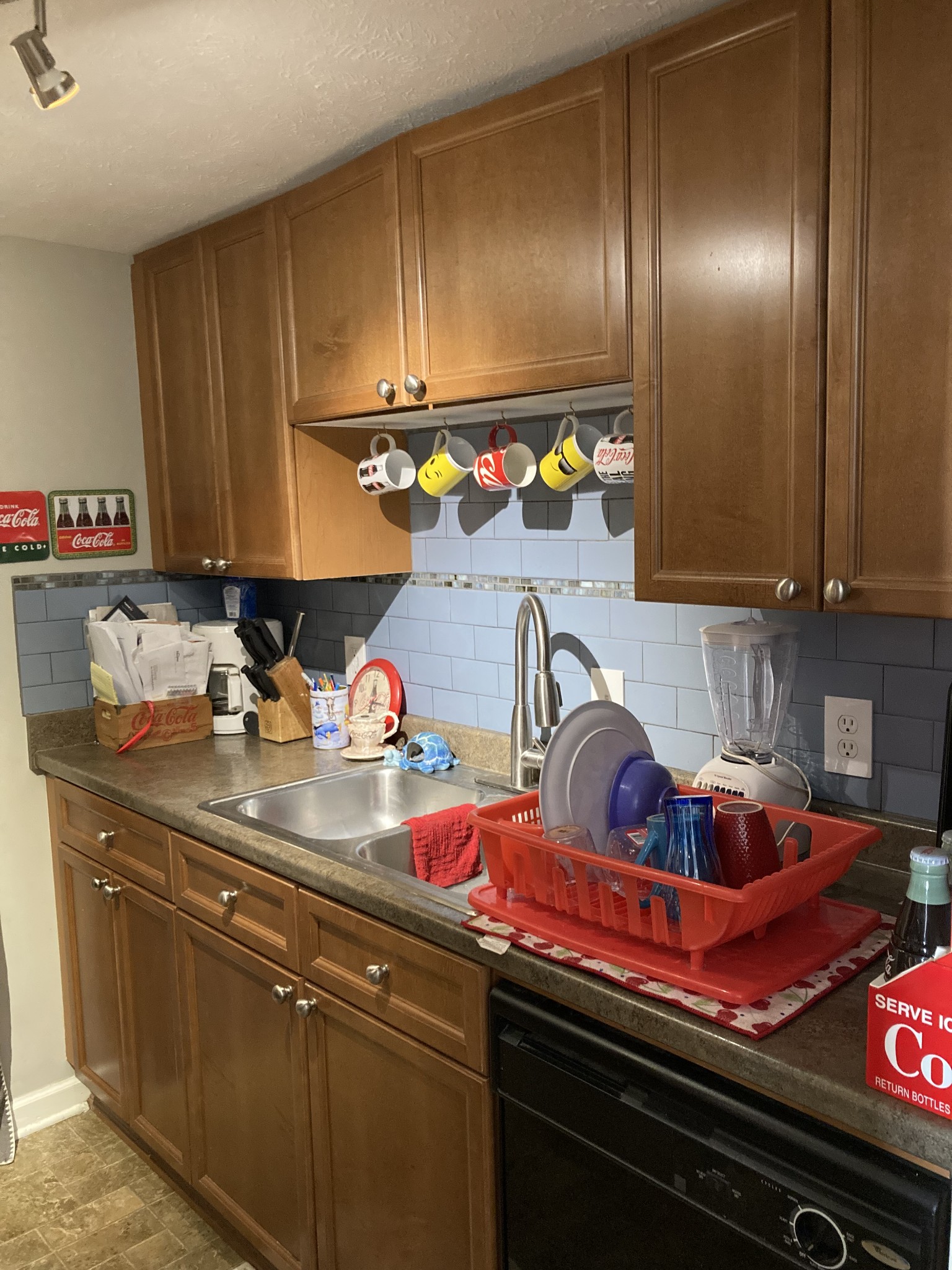 420 Elysian Fields Road, Unit E5 Nashville, TN 37211 - Photo 7 of 14 a kitchen with stainless steel appliances granite countertop a sink and cabinets