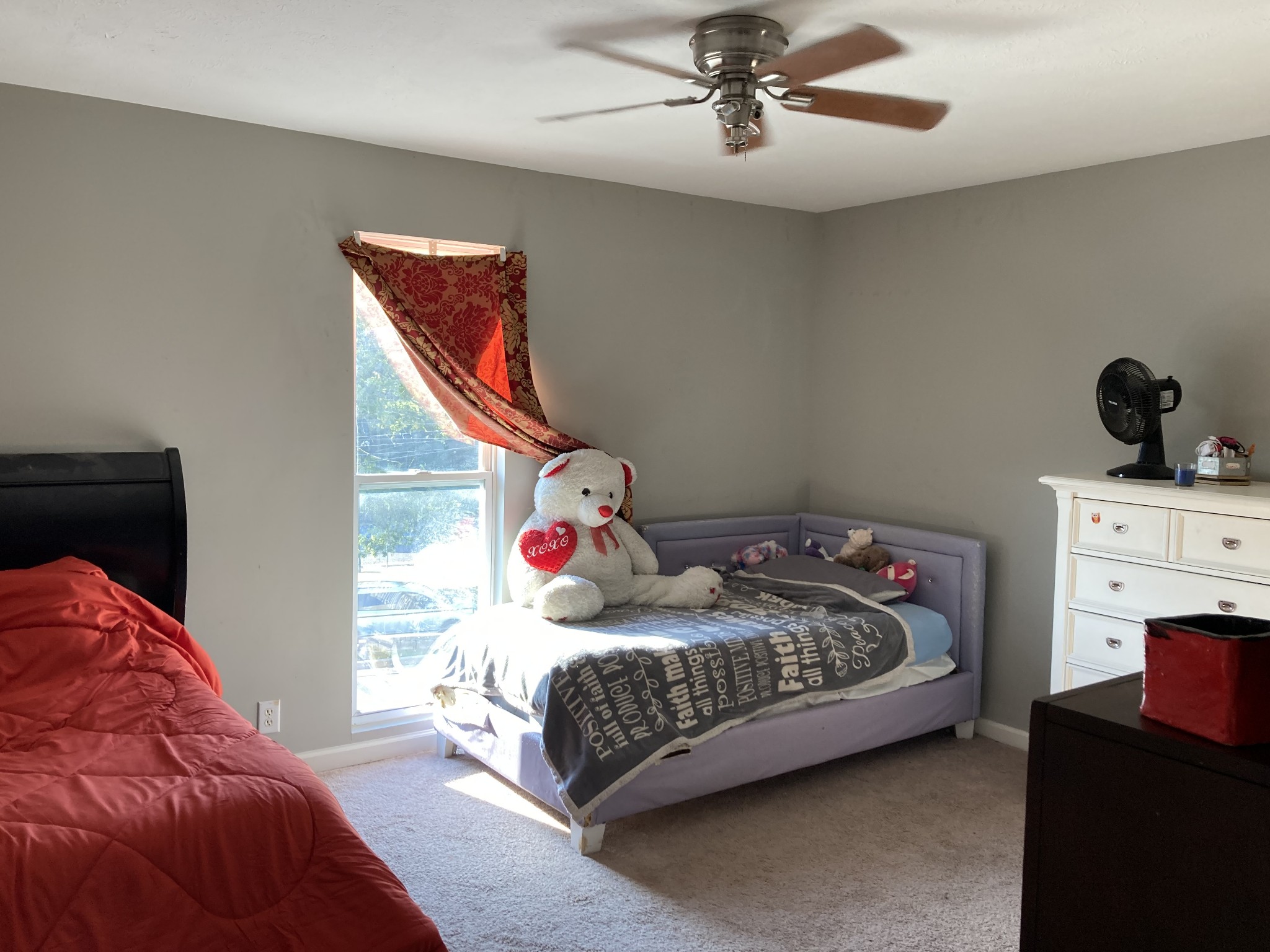 420 Elysian Fields Road, Unit E5 Nashville, TN 37211 - Photo 10 of 14 a bedroom with a bed and a chandelier