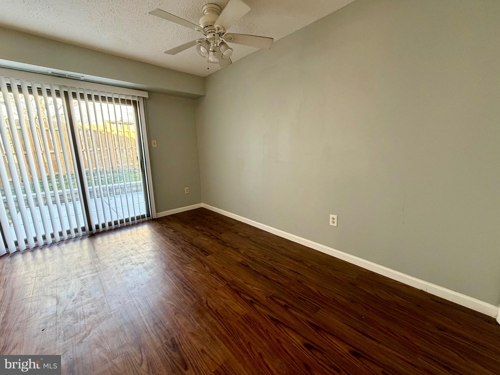 33 Georgetown Road Lindenwold, NJ 08021 - Photo 11 of 27 a view of an empty room with wooden floor and a window