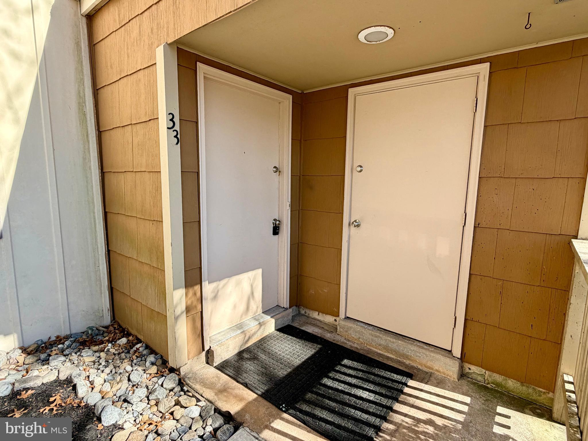 33 Georgetown Road Lindenwold, NJ 08021 - Photo 2 of 27 a bathroom with a glass door shower and a sink