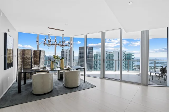a bathroom with a toilet a sink and a shower