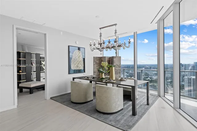 a bathroom with a toilet sink and shower