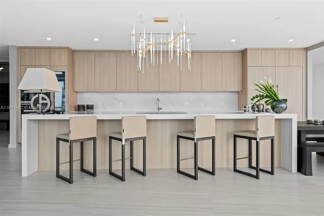 a view of a livingroom with workspace and a couch