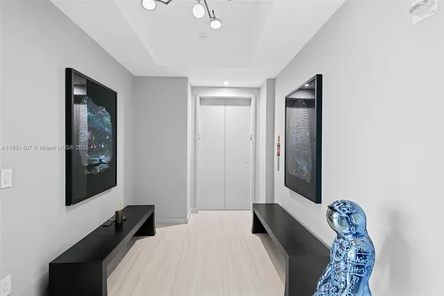 a large kitchen with a table and chairs