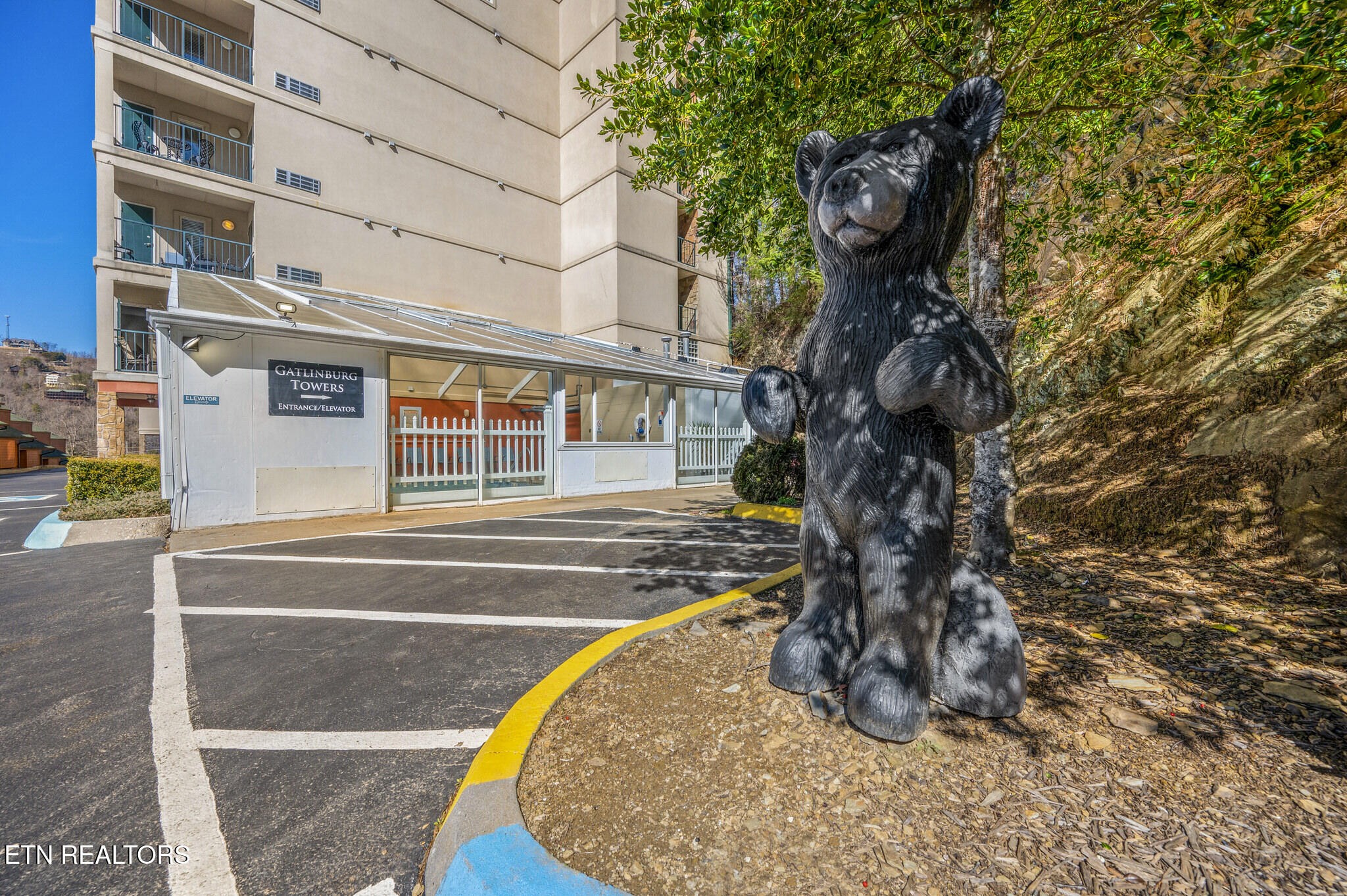 a view of a house with a small park