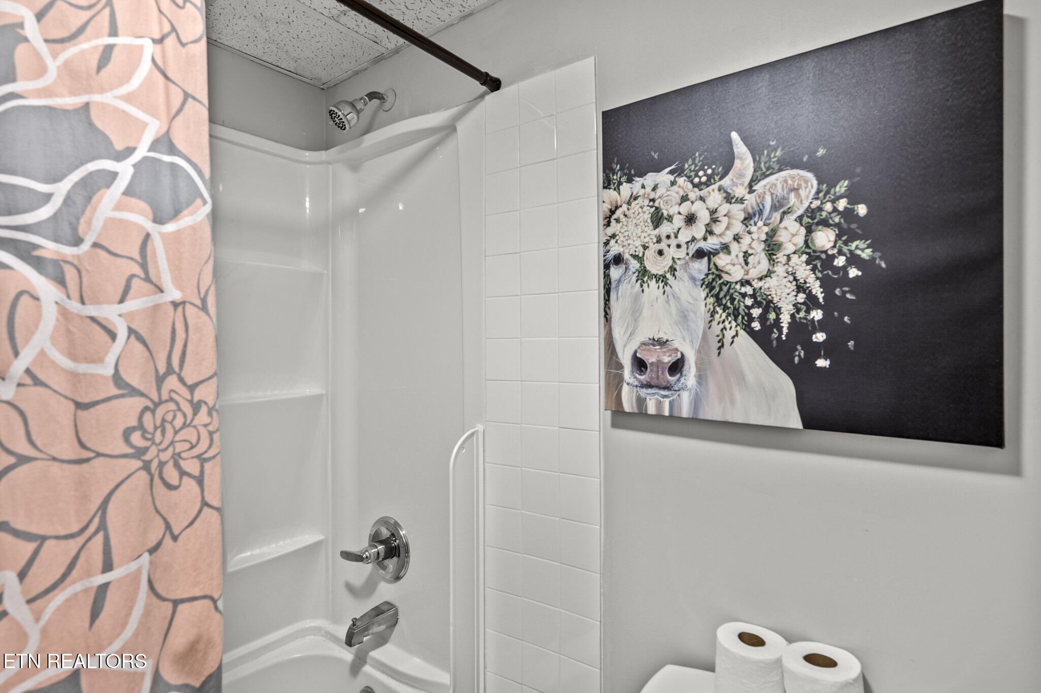 413 Baskins Creek Road, Unit 406 Gatlinburg, TN 37738 - Photo 23 of 26 a bathroom with a sink mirror and vanity