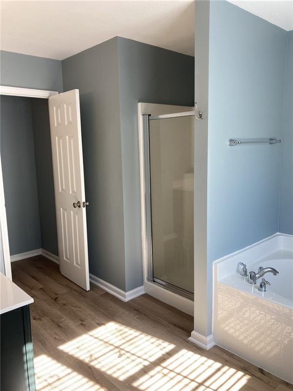 66 Godley Park Way Savannah, GA 31407 - Photo 11 of 20 a view of bedroom with a bed and wooden floor