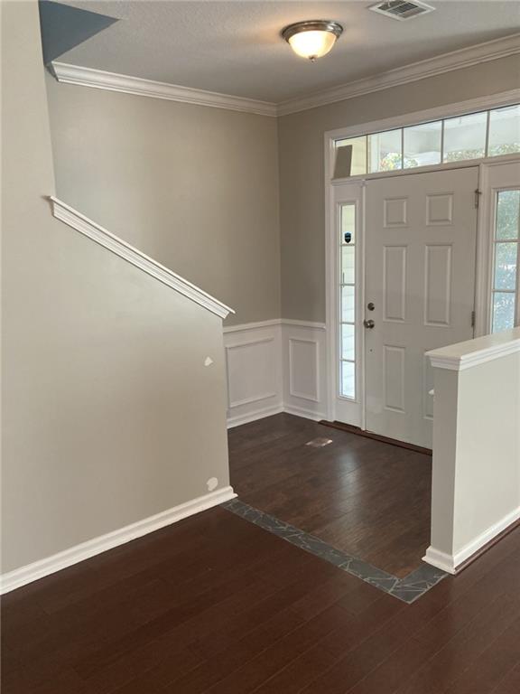 66 Godley Park Way Savannah, GA 31407 - Photo 17 of 20 an empty room with wooden floor and windows