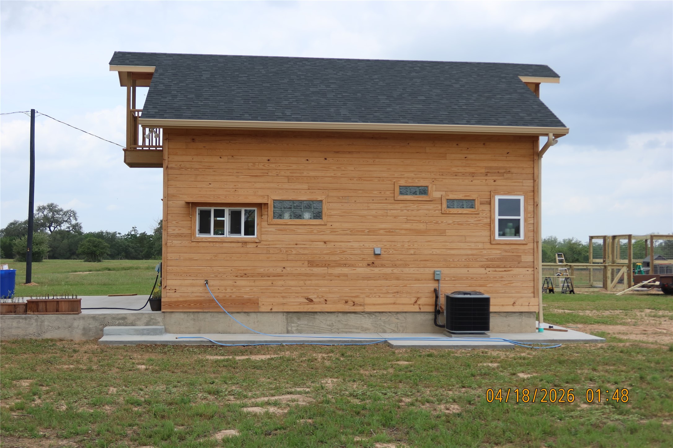 1052 Railhead Road Columbus, TX 78934 - Photo 14 of 31 a front view of a house with a yard
