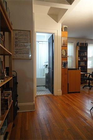 48 Strathmore Road, Unit 26 Boston, MA 02135 - Photo 4 of 10 a view of livingroom with furniture and wooden floor