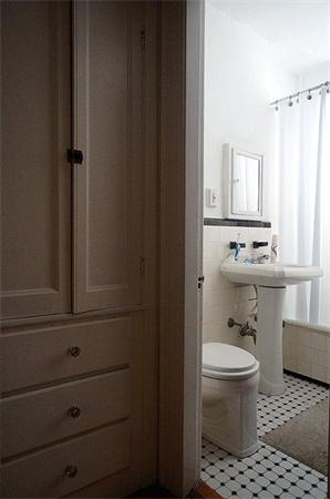 48 Strathmore Road, Unit 26 Boston, MA 02135 - Photo 5 of 10 a bathroom with a sink toilet and window
