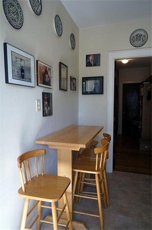 48 Strathmore Road, Unit 26 Boston, MA 02135 - Photo 8 of 10 a dining room with furniture and window