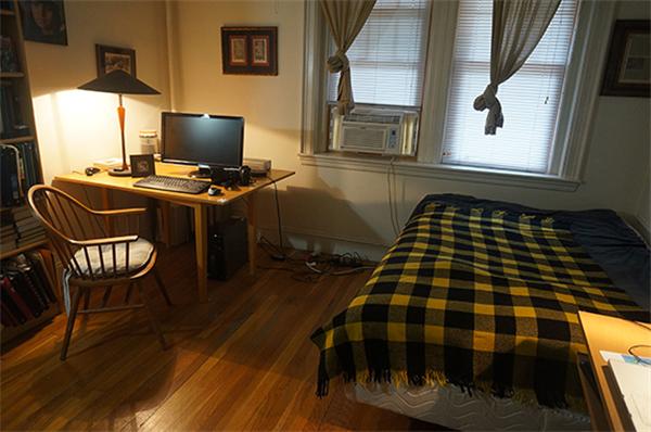 48 Strathmore Road, Unit 26 Boston, MA 02135 - Photo 9 of 10 a bedroom with wooden floor bed and a window