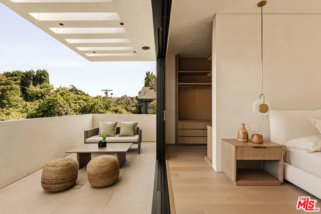 a view of a room with wooden walls