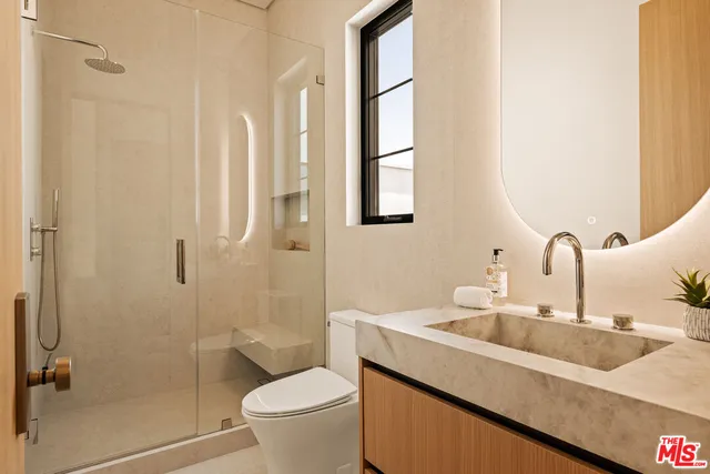 a view of balcony with furniture