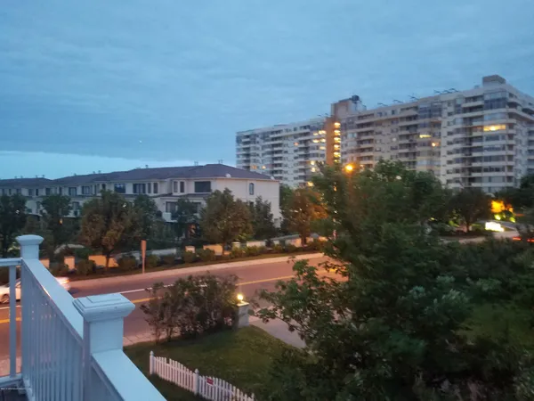 a view of a balcony with city view