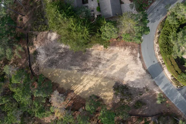 a backyard of a house with lots of green space