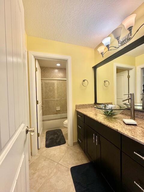 4334 Highway 441, Unit 6 Okeechobee, FL 34974 - Photo 12 of 15 a spacious bathroom with a shower a sink and a mirror