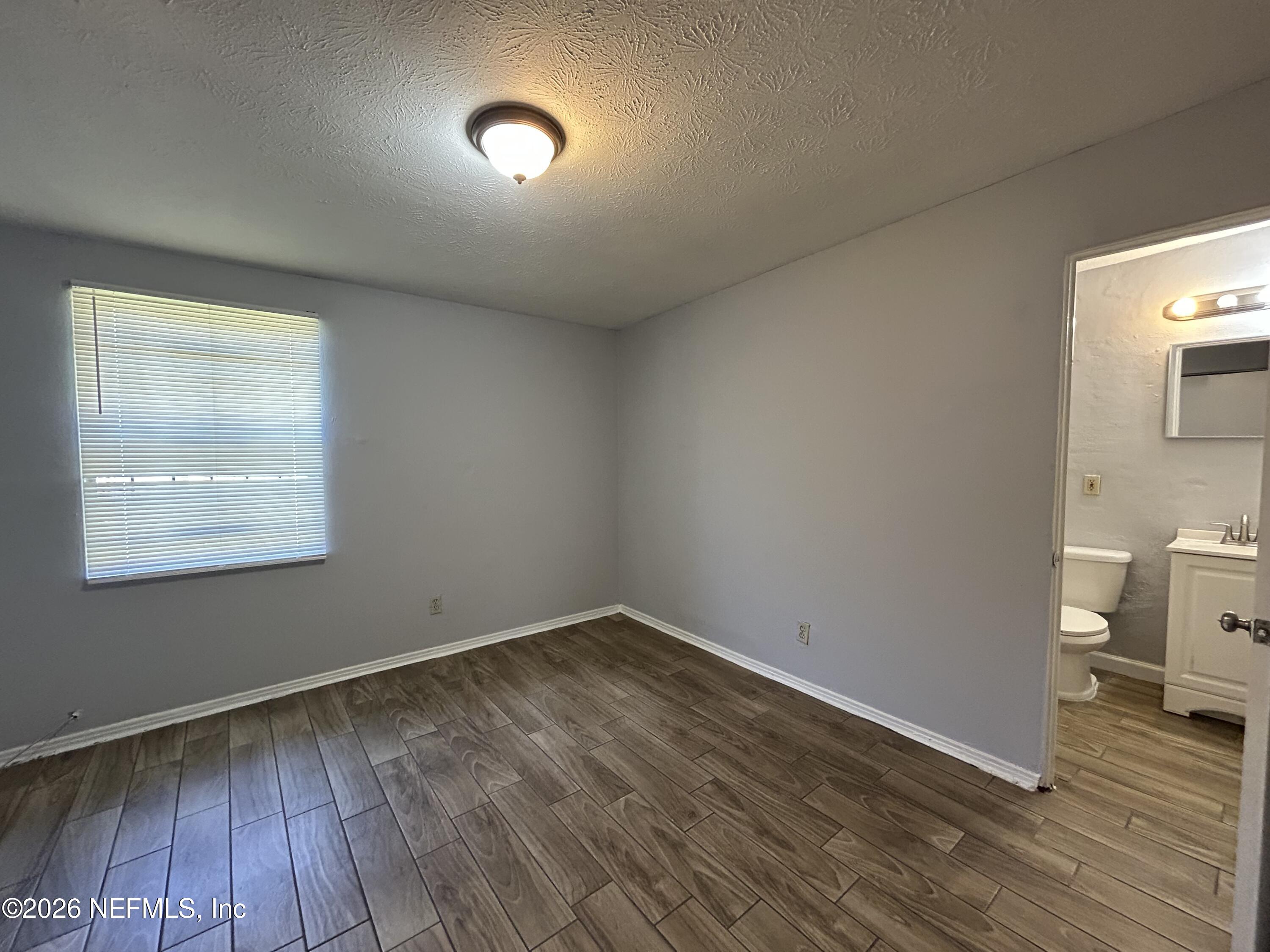 3250 Phyllis Street Jacksonville, FL 32205 - Photo 7 of 9 wooden floor in a empty room