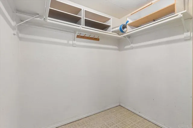 a view of a room with racks on the wall