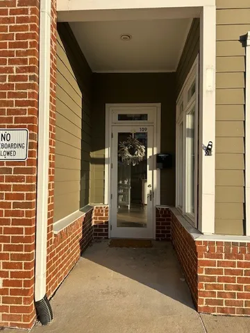 a view of a porch with a door