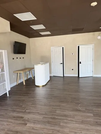 a view of a livingroom with wooden floor